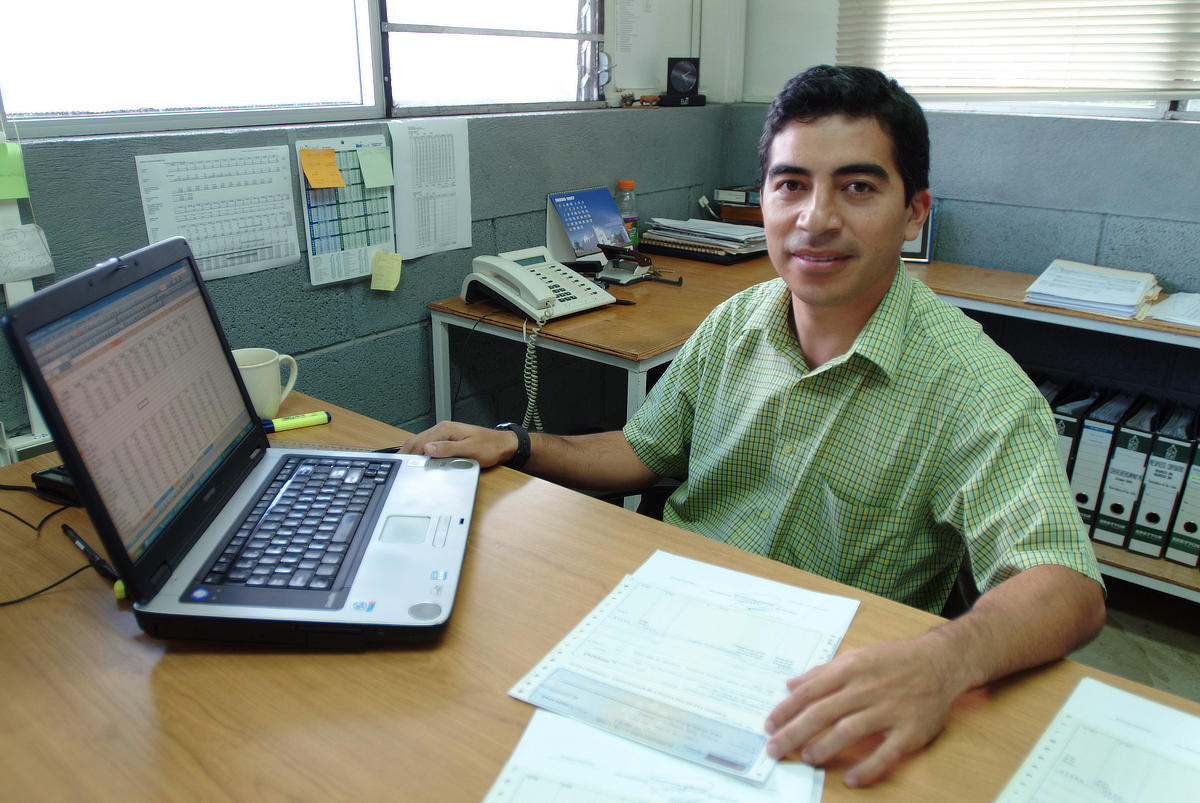 Financial controller sitting at desk